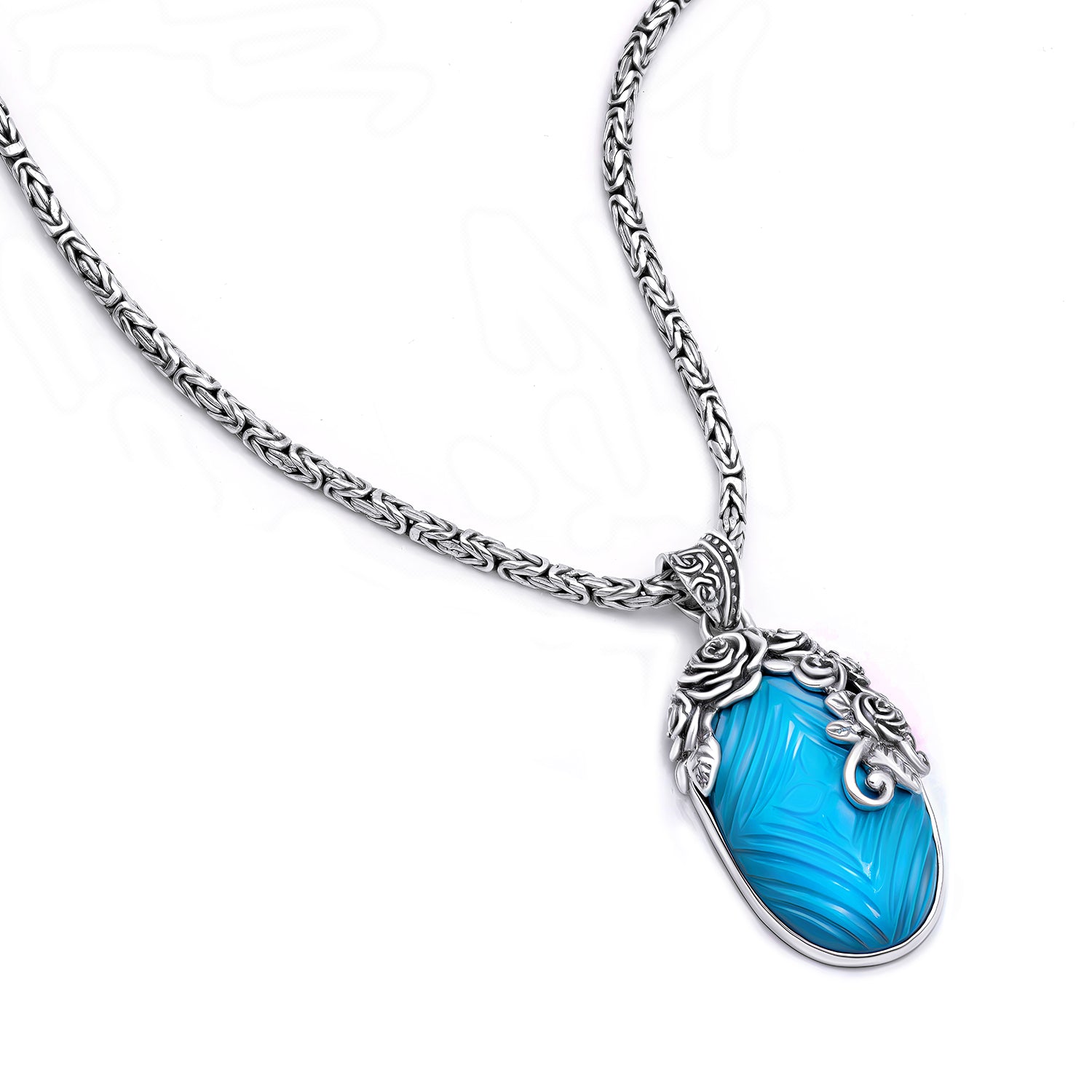 Sterling Silver & Carved Turquoise Balinese Pendant