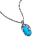 Sterling Silver & Carved Turquoise Balinese Pendant